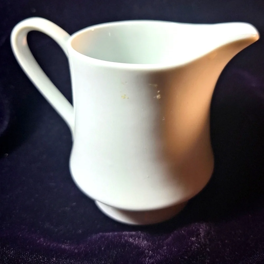 White porcelain creamer